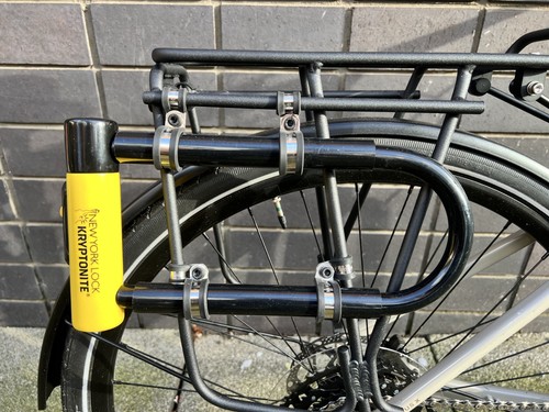 Rear pannier rack carry mount